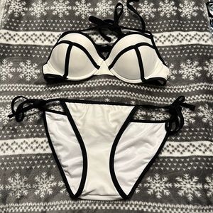 White and black bikini! Top is M and bottoms are XS/TP